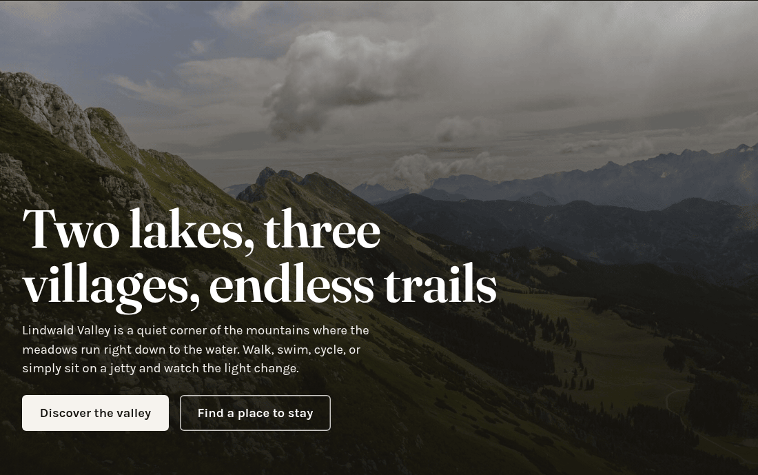 A Hero element: a large white heading and a short introduction over a dark mountain photo, with two buttons
