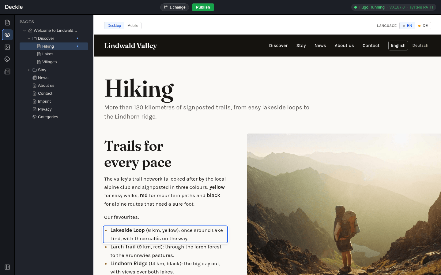 The View module with the Hiking page; the changed sentence about three cafés is highlighted
