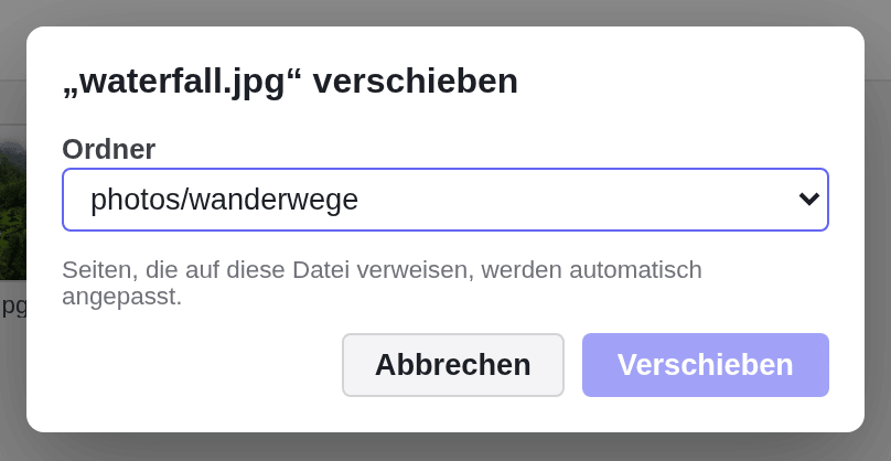 Der Dialog zum Verschieben von waterfall.jpg mit der Liste Ordner, auf photos/wanderwege gesetzt, und dem Hinweis Seiten, die auf diese Datei verweisen, werden automatisch angepasst